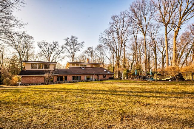 View of yard with fence | Image 13