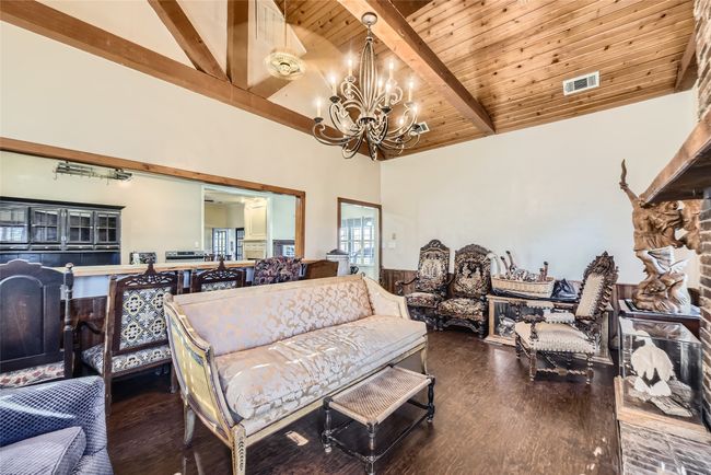 Serve up some food and drinks at this extensive bar in your fabulous family room! | Image 29
