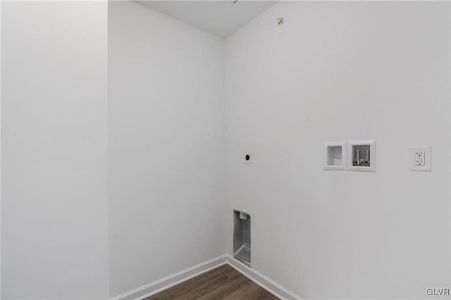 Model photos of townhomes. Second floor laundry room. | Image 27