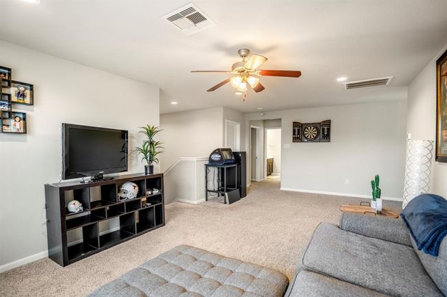 The upstairs game room and 3 secondary bedrooms, a full bath and an added flex room for extra space. | Image 37