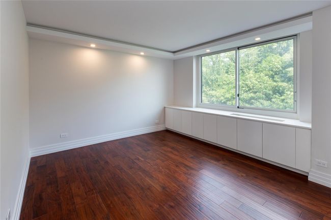 Unfurnished room featuring recessed lighting and dark wood-type flooring | Image 13