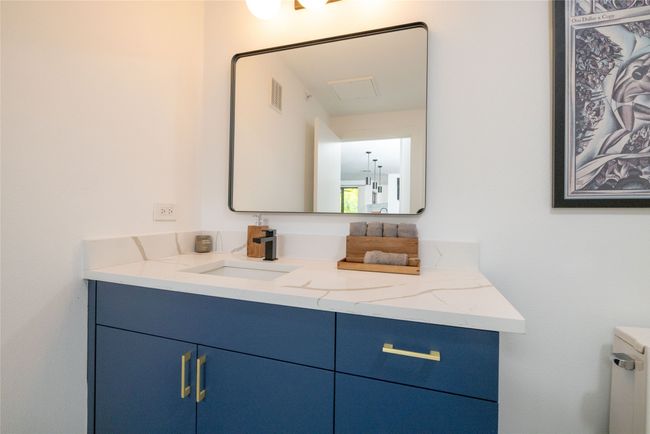 Guest bathroom with vanity | Image 26