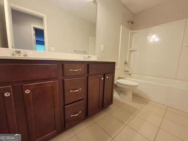 8265 Village Pl, Townhouse with 3 bedrooms, 3 bathrooms and 2 parking in Suwanee GA | Image 24