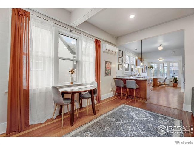 High ceilings throughout main level. Kitchen opens to living room and dining room | Image 10