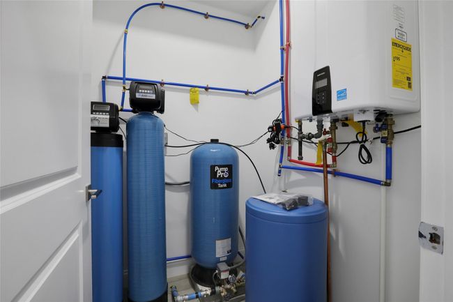 Utilities featuring tankless water heater | Image 31