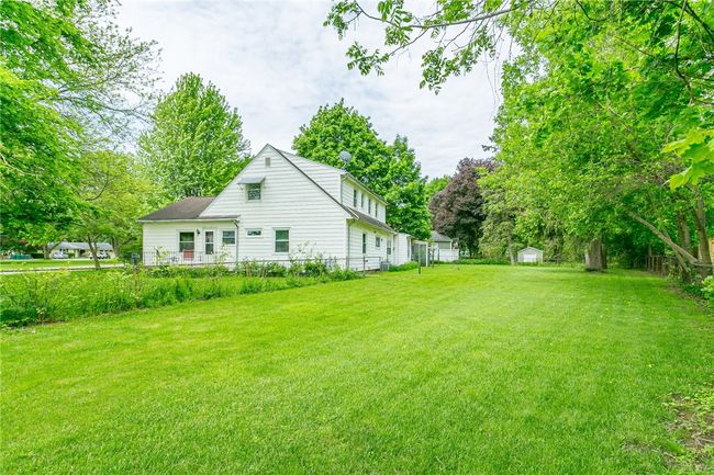 Spacious fenced in back yard | Image 6