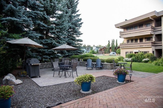 View of patio with area for grilling | Image 16