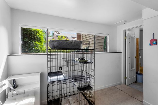Carpeted bedroom with baseboards | Image 29