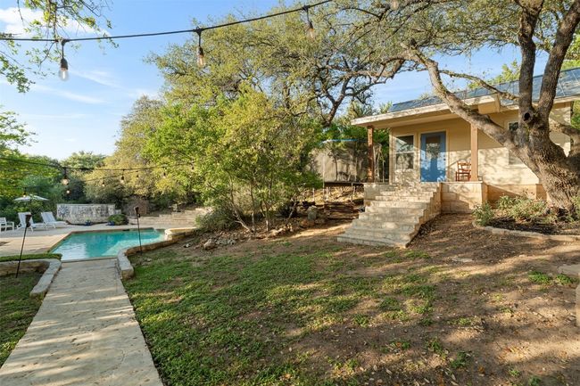 View of yard with an outdoor pool and a patio | Image 31
