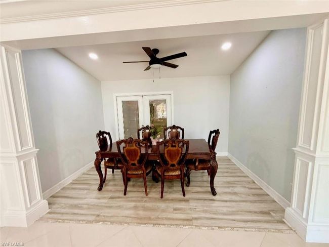 Dining area featuring recessed lighting, ceiling fan, french doors, and baseboards | Image 9