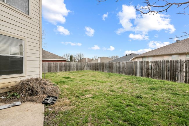 View of yard featuring a fenced backyard | Image 11