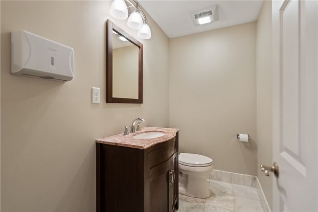 2nd floor women's half bath. Could be converted to a full bath room. | Image 21