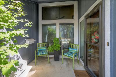 Have a glass of lemonade on this cozy porch. | Image 3