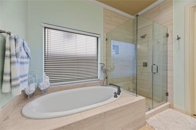 Alternate view of soak in tub and walk in shower. | Image 19