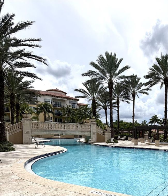 Outdoor heated pool with water exercise classes. | Image 42