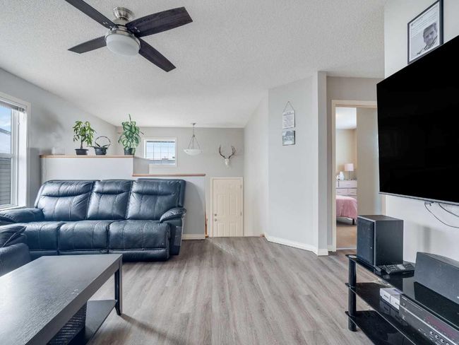 221 Ranch Ridge Crt, Home with 4 bedrooms, 3 bathrooms and 4 parking in Strathmore AB | Image 4