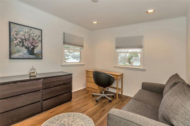 Office/Bedroom area featuring ornamental molding, baseboards, and wood finished floors | Image 23