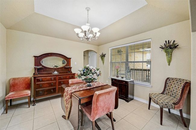 Tray ceiling adds character to the dining room. | Image 8