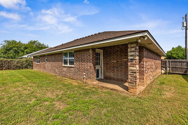 Rear view of house featuring brick siding | Image 14