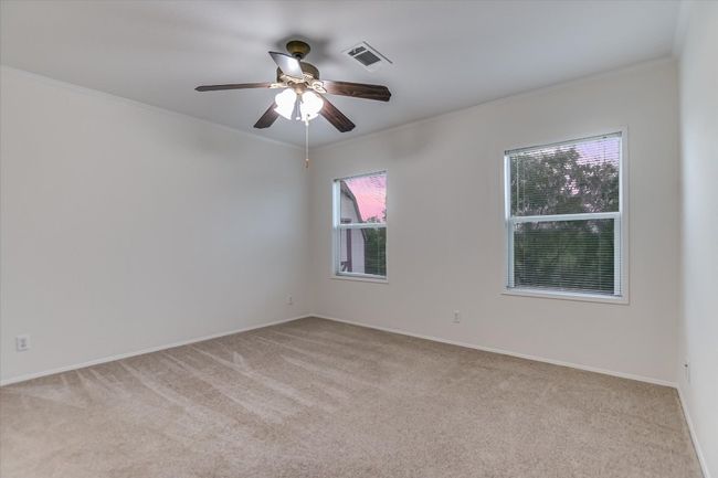 Primary bedroom has private pasture views, a closet, and is attached the the primary private bathroom | Image 13