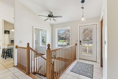 Open and welcoming foyer! Entry door has internal mini-blinds for nighttime privacy. | Image 3