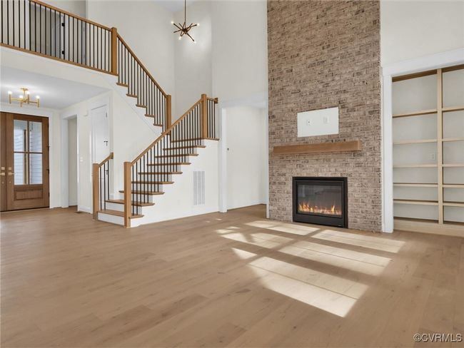 Photo represents the plan, not the actual home. Design selections may vary. The focal point of the home is the two-story family room. | Image 7