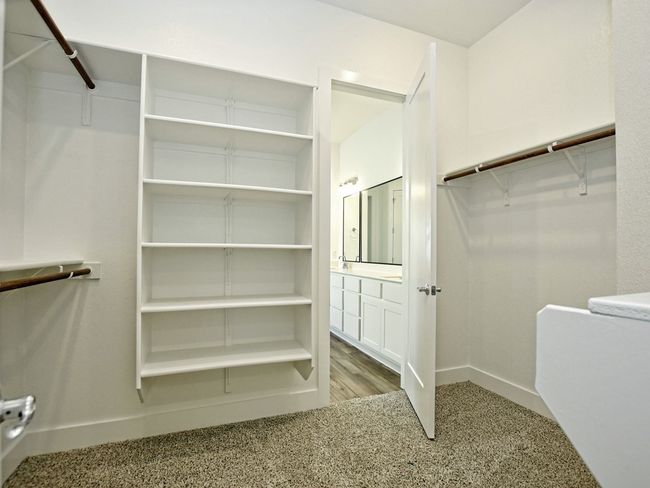 View of spacious closet | Image 17