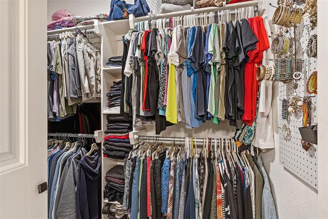 Spacious closet featuring carpet floors | Image 15