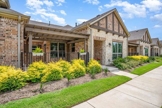 Landscaped front elevation maintained by HOA | Image 5