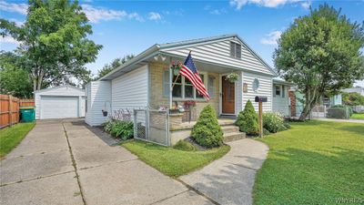 CONCRETE DRIVEWAY WITH GATED FENCE ENTRY | Image 2