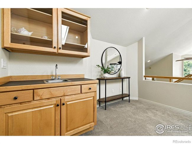 A wet bar completes the loft area. | Image 18