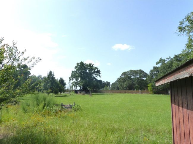 Including a generous open lot property, perfect for outdoor living, entertaining, or future additions. | Image 16