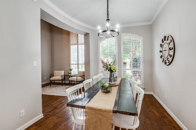 Another view to the Dining Room, to the left is another living space | Image 16
