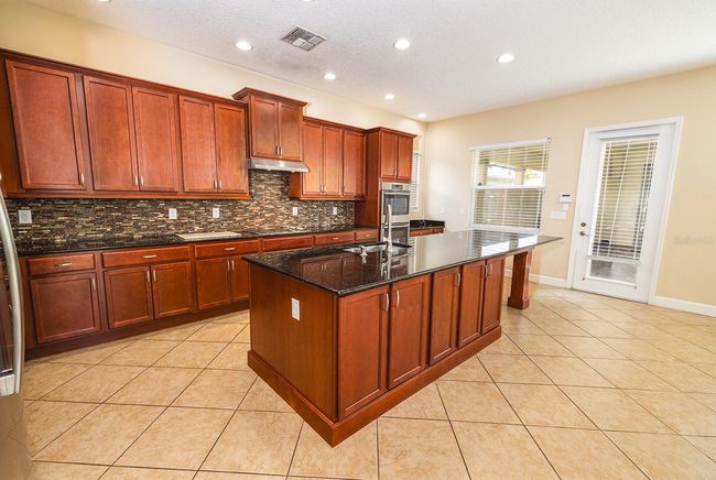 14029 Mcfadden Ln, House other with 3 bedrooms, 3 bathrooms and null parking in ORLANDO FL | Image 17