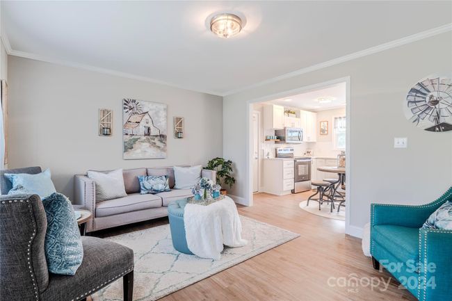 View of cozy living room from front door! | Image 6