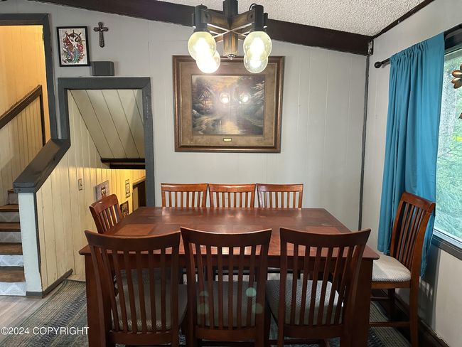 Dining area/stairs to up and downstairs | Image 8