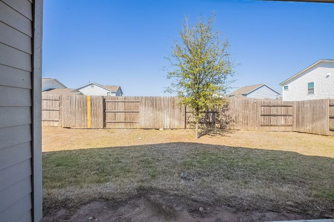 View of yard with a fenced backyard | Image 30