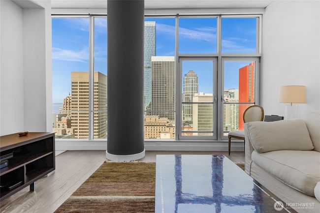 10.5 foot floor to ceiling windows floods unit with light! | Image 9