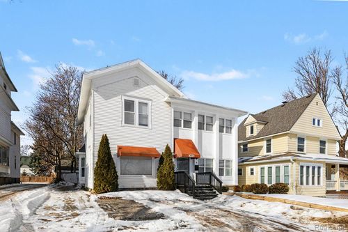 1031 N Washington Ave, Lansing, MI, 48906-4840 | Card Image