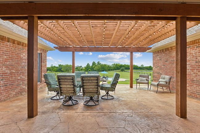 View of patio / terrace featuring outdoor dining space and a pergola | Image 32