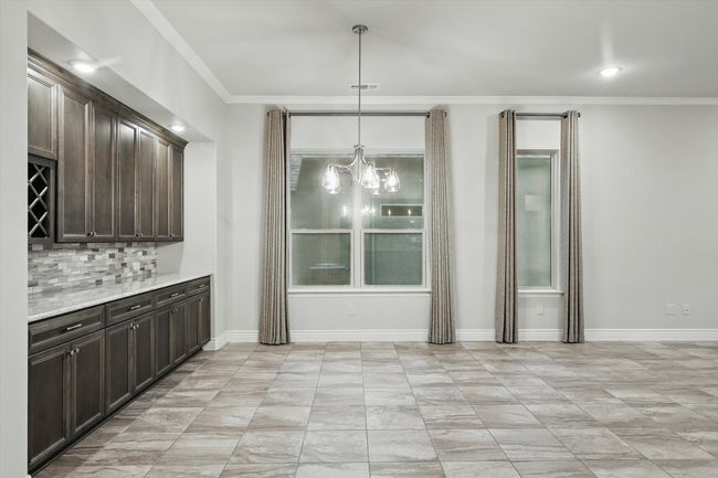 Dining Area with built-in buffet and cabinets | Image 9