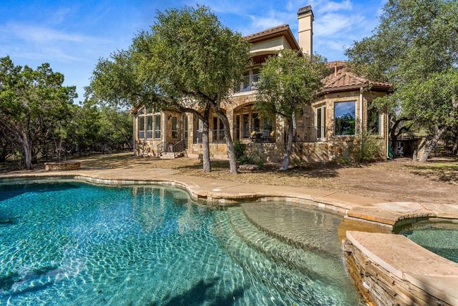 Cool off in backyard pool on a hot summer day. | Image 32