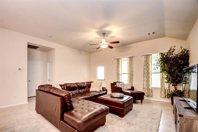 High ceilings and tons of natural light make this a space you will love to spend time in. | Image 15