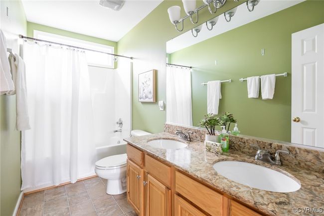 Hallway Bathroom with double sinks | Image 42