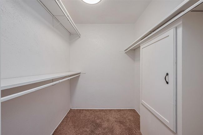 Walk in closet located in primary bedroom | Image 18