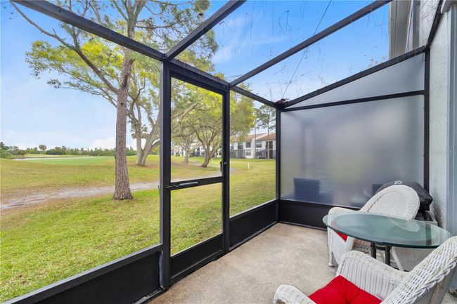 private rear lanai with golf course view | Image 20