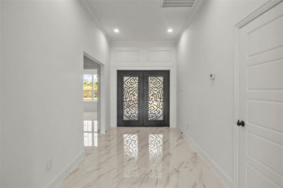 Entryway featuring crown molding | Image 3