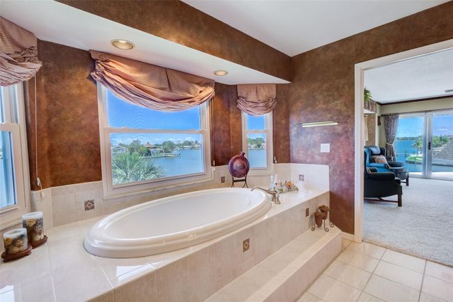 5913 Bali Way N, House other with 5 bedrooms, 3 bathrooms and null parking in St Pete Beach FL | Image 38