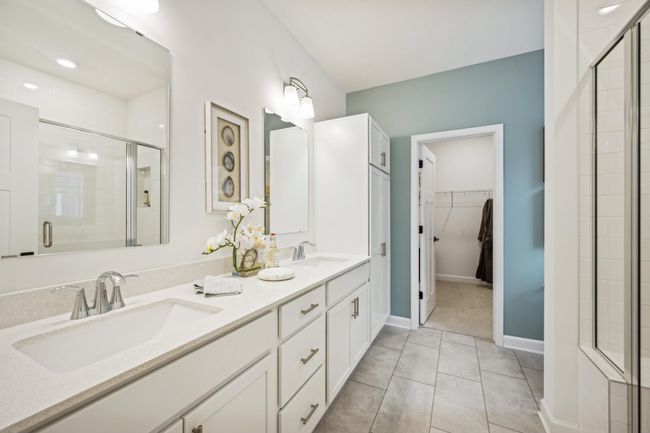 Photo is of the actual model. An extension of the primary bedroom, is this stunning bath! | Image 11