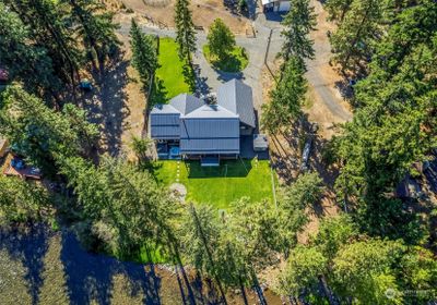 Aerial view to showcase placement of the home and yardspace. | Image 3